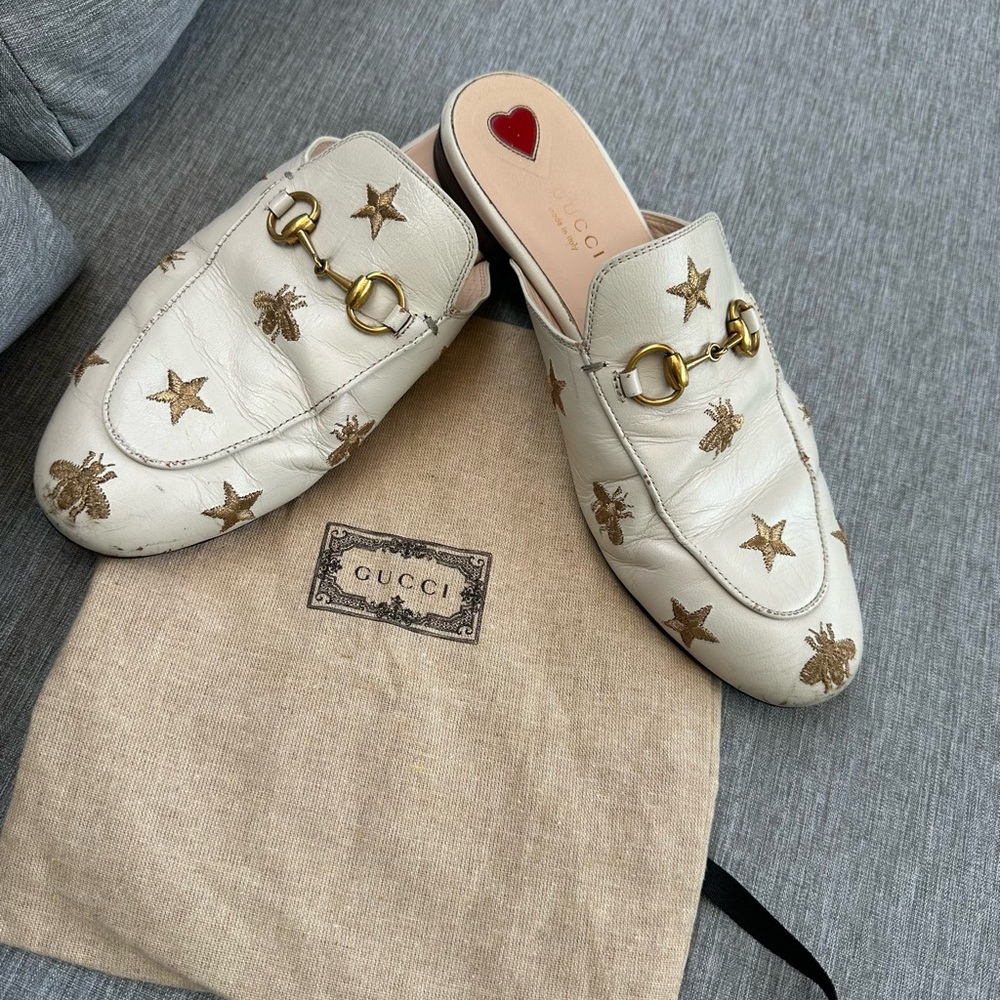 Gucci Women's White Mules with Gold Embellishments
